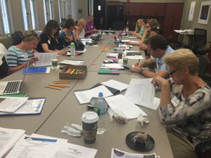High school math and science teachers working to complete a Data Nugget during a professional development workshop.