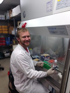 Adam working under the hood, reprogramming specialized cells into induced pluripotent stem cells for his experiments.