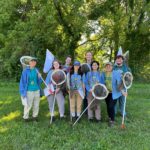 Group of researchers ready to go out into field to butterfly survey.